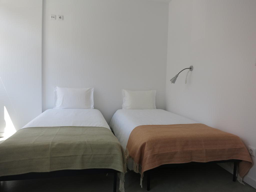 Quarto Triplo com Duche