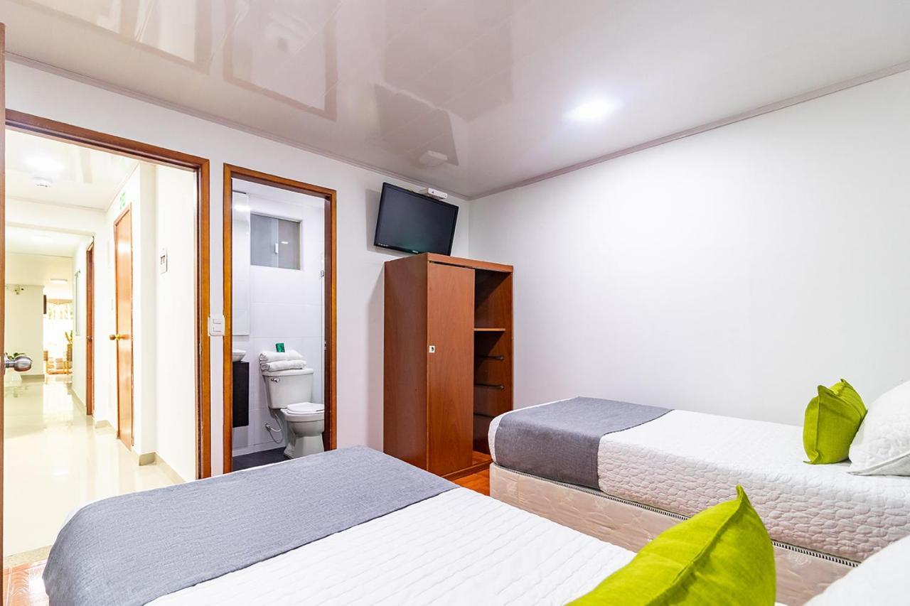 Quarto com 2 Camas de Solteiro