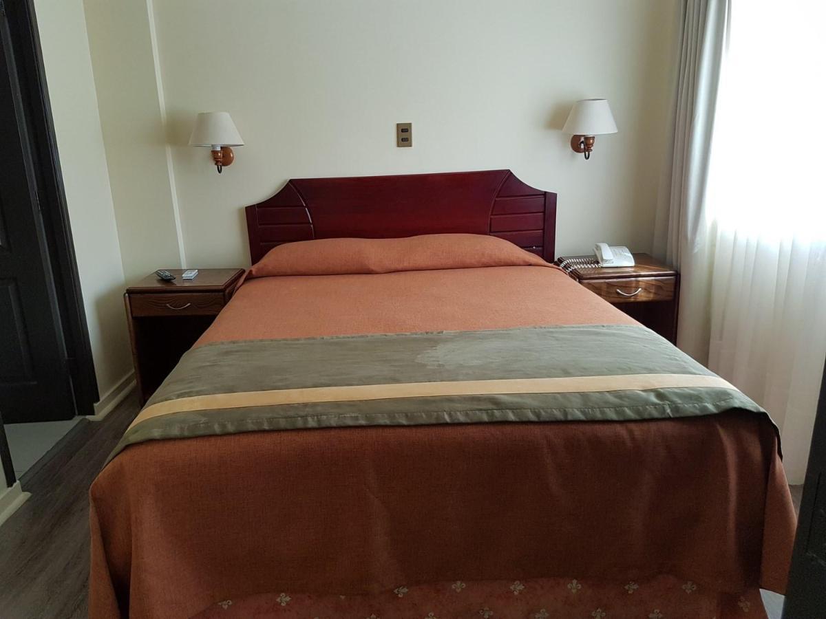 Quarto com Cama Queen-size