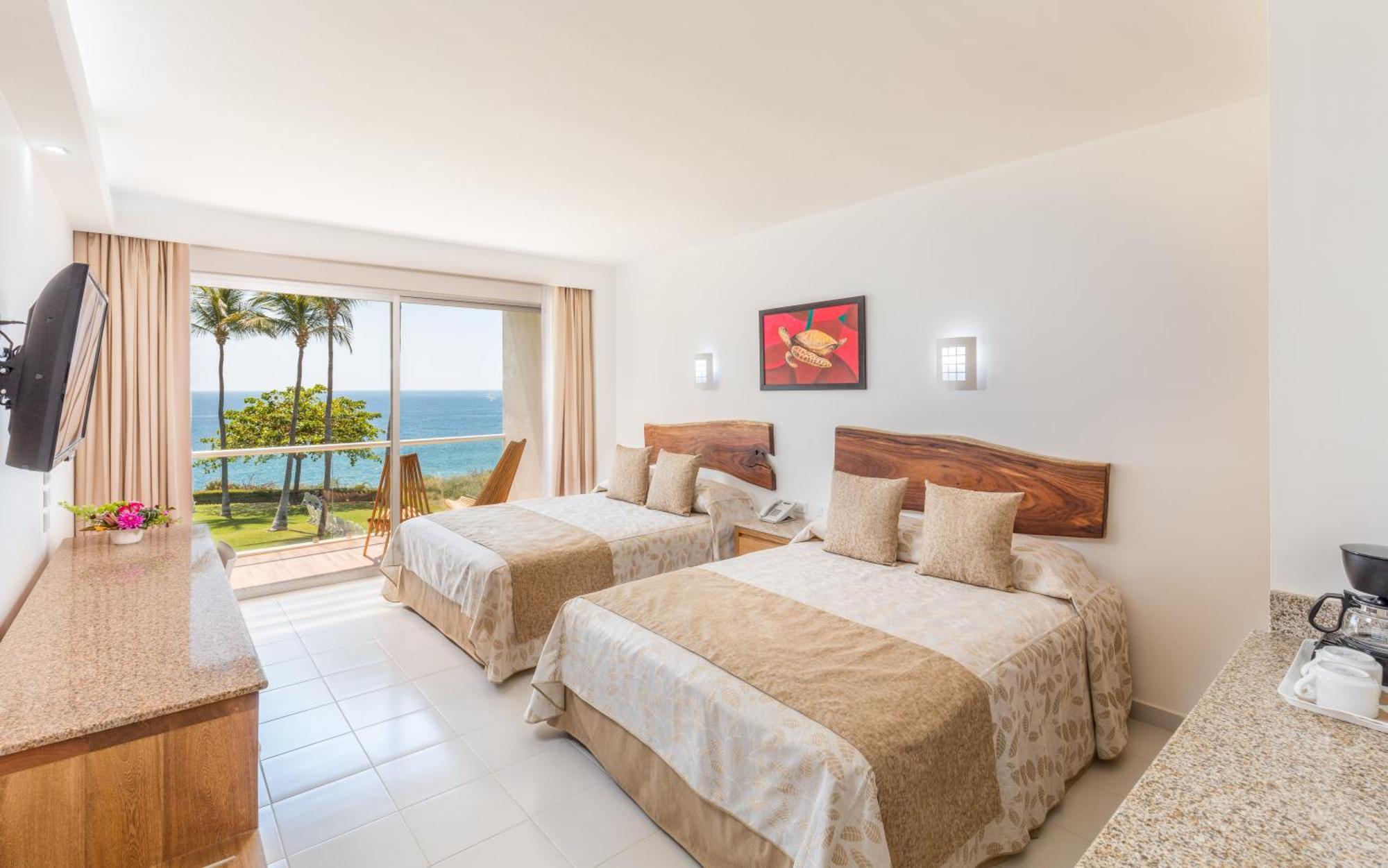 Quarto com Cama Queen-size e Vista do Mar