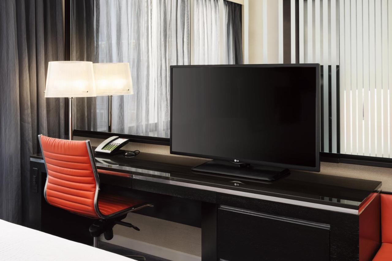 Habitación Doble Esquinera con vistas a la ciudad - Cama extragrande