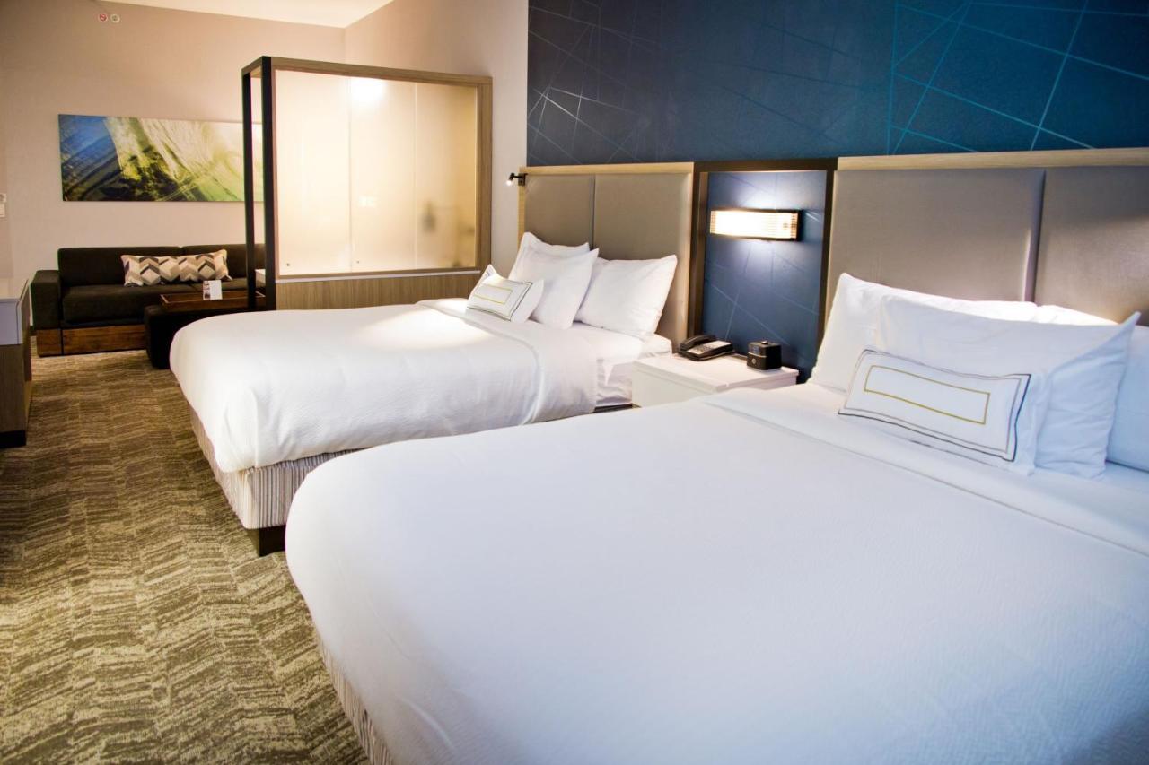 Queen Suite with Two Queen Beds and Sofa Bed