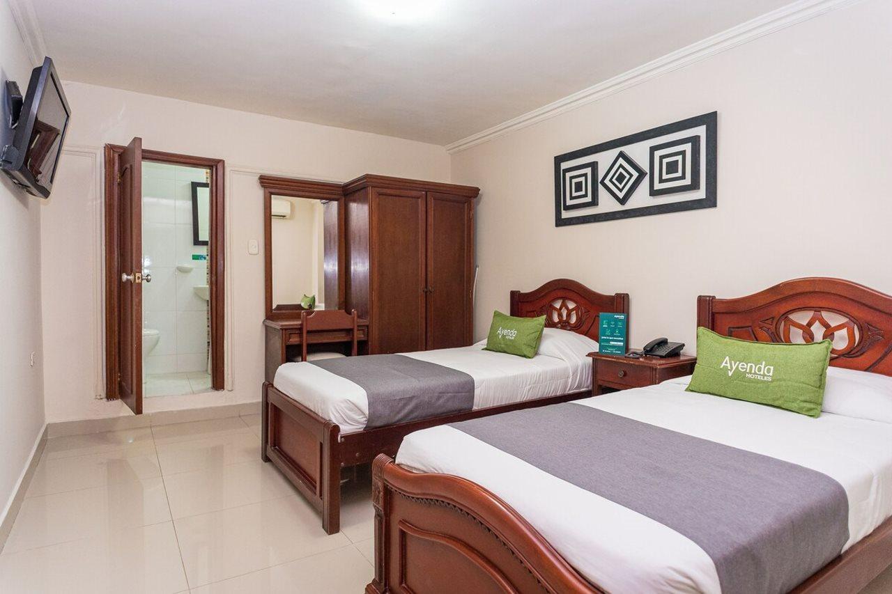 Quarto com 2 Camas de Solteiro