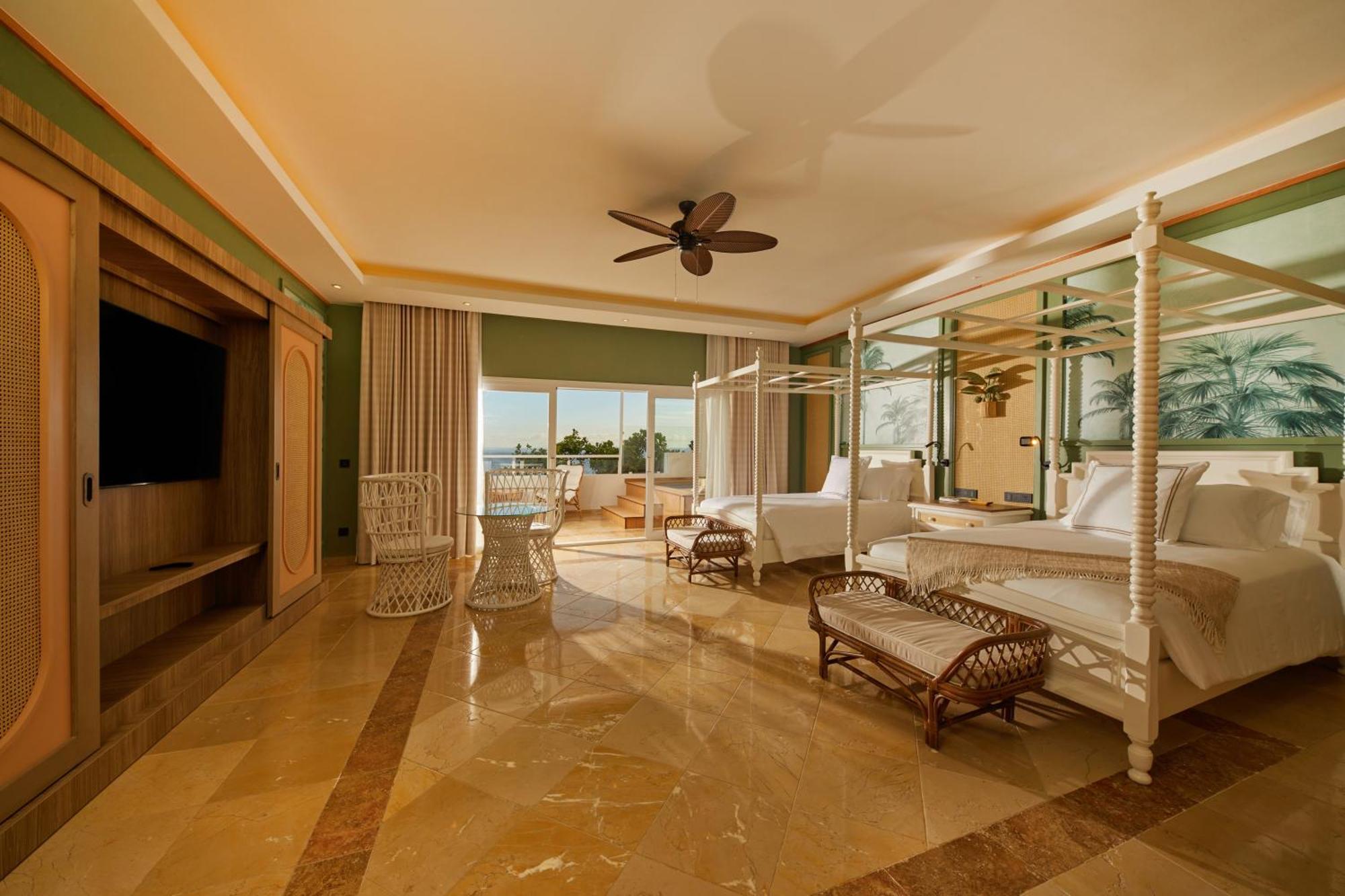 Junior Suite mit Meerblick und Tauchbecken (2 Erwachsene + 1 Kind)