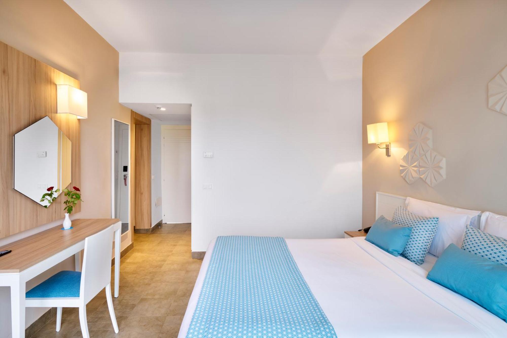 Habitación Familiar con vistas al mar (2 adultos + 2 niños)