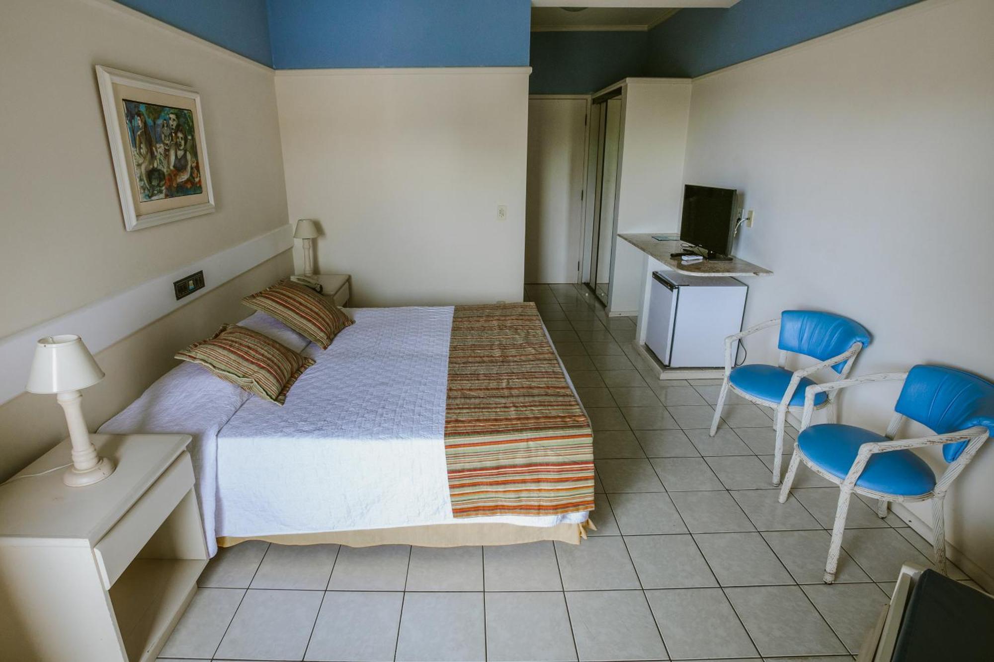 Quarto Deluxe com Vista Piscina