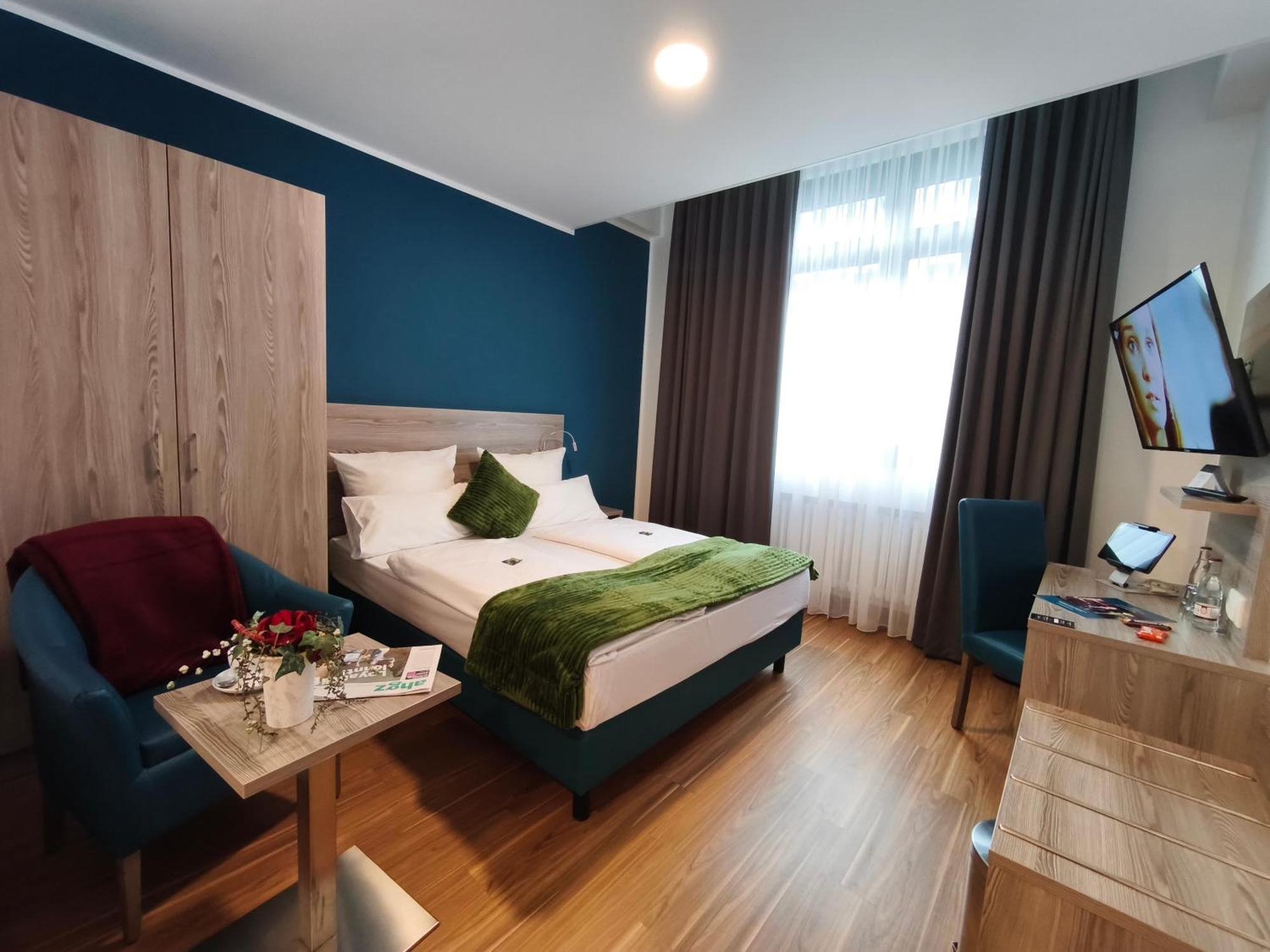 Doppel- oder Zweibettzimmer