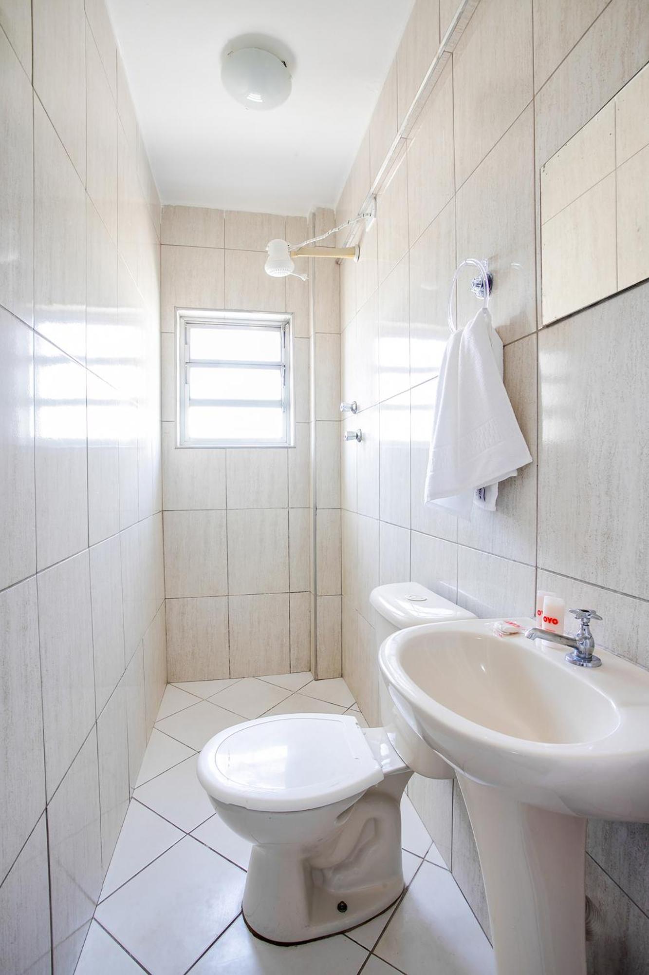 Quarto Quádruplo (1 Cama de Casal + 2 Camas Individuais)