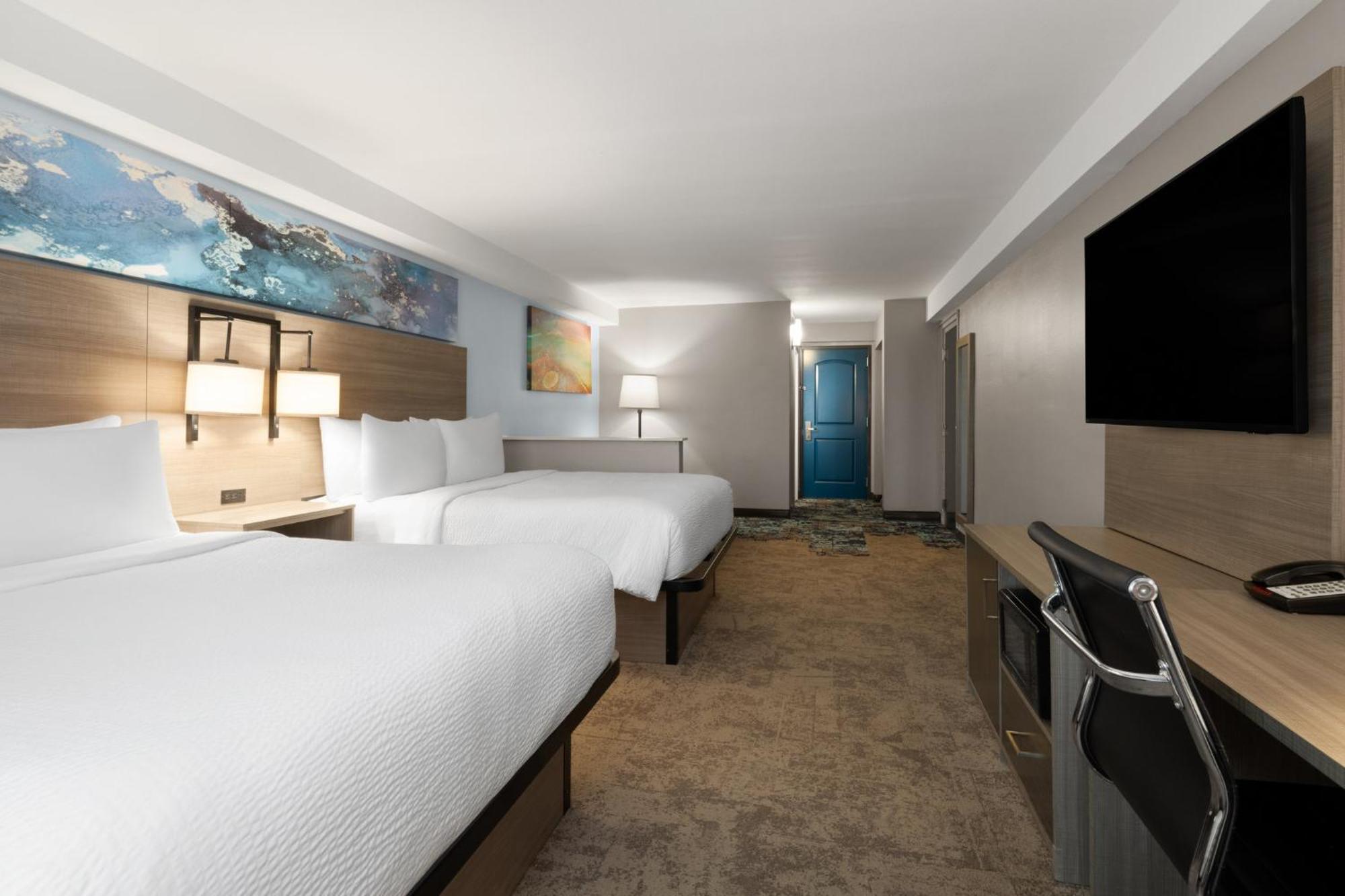 Standard Queen Room with Sofa Bed and Partial Ocean View
