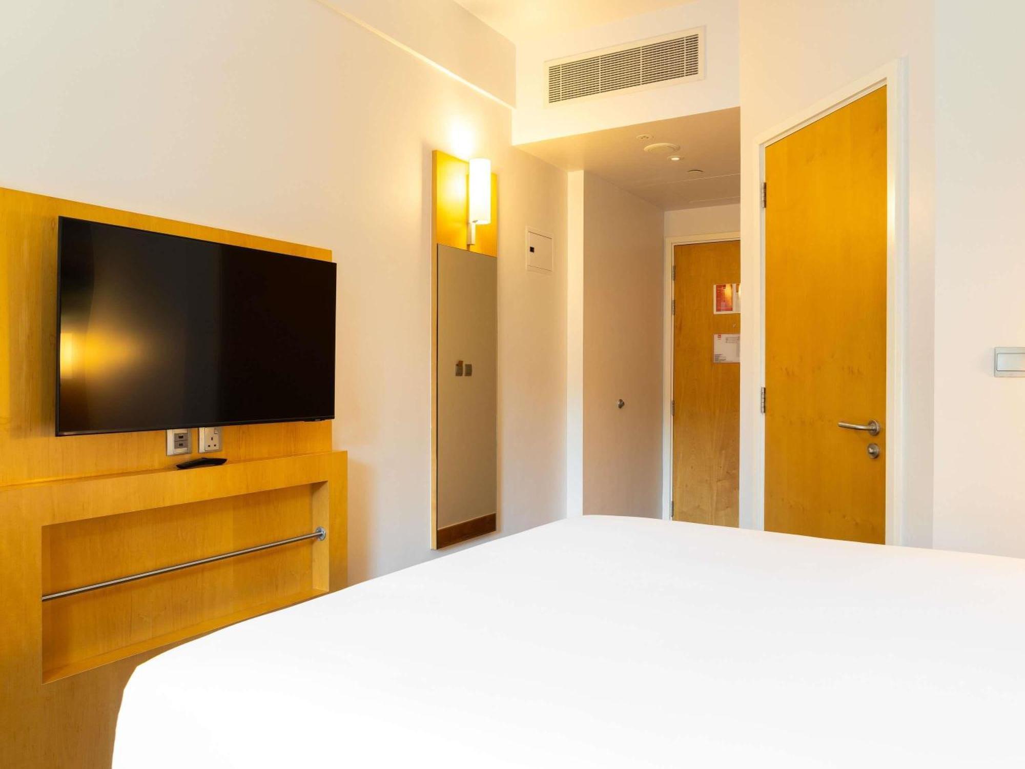 Chambre Lit Queen-Size Premium