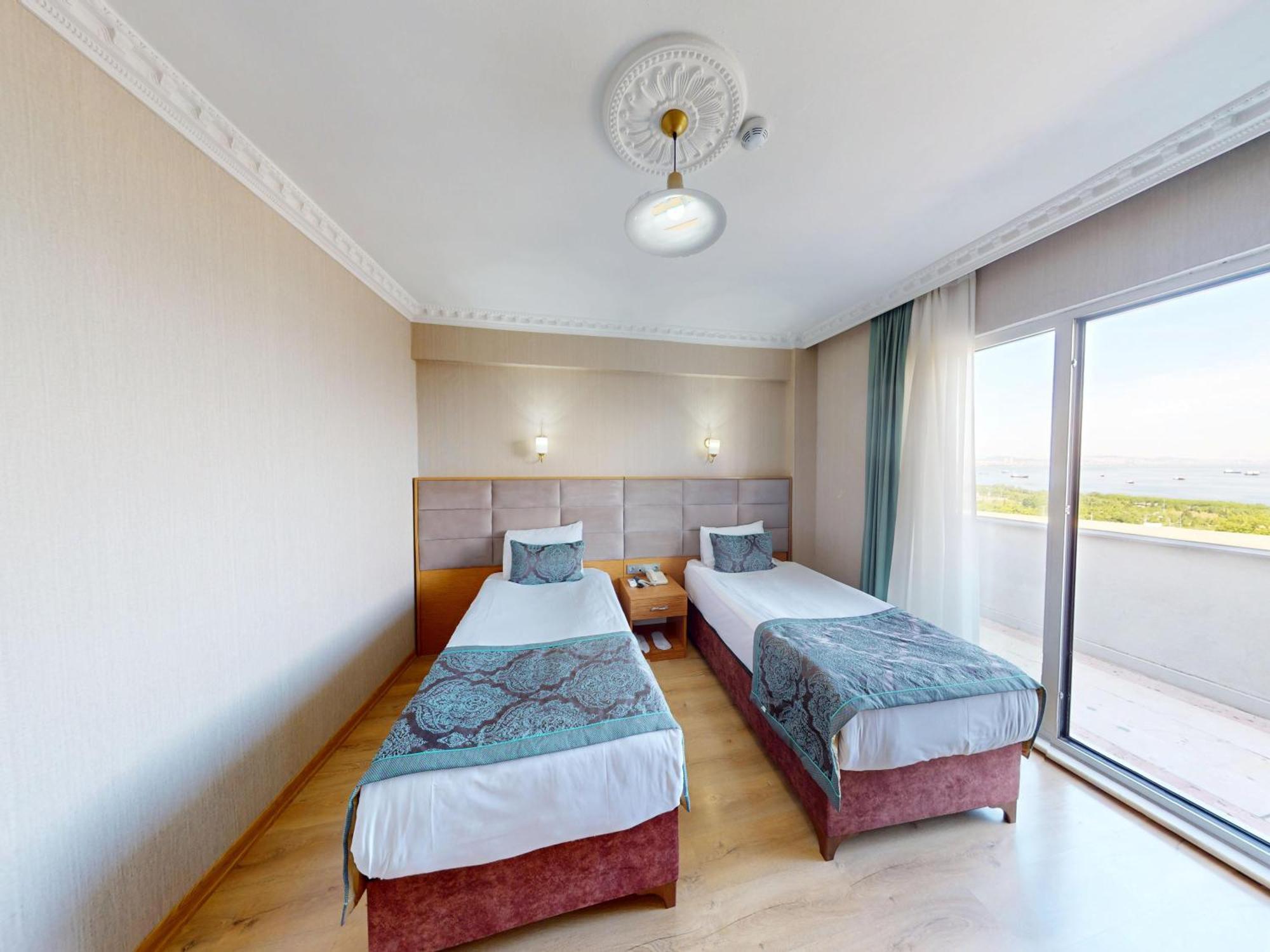 Deluxe Tweepersoonskamer met 1 of 2 Bedden en Uitzicht op Zee