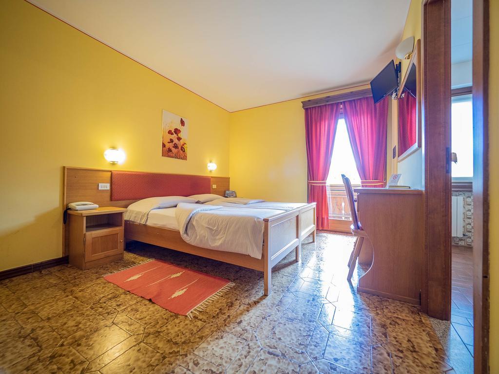 Dreibettzimmer mit Skipass