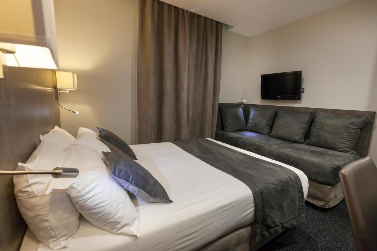 Quarto Duplo Superior com Sofá-cama - Não Fumadores