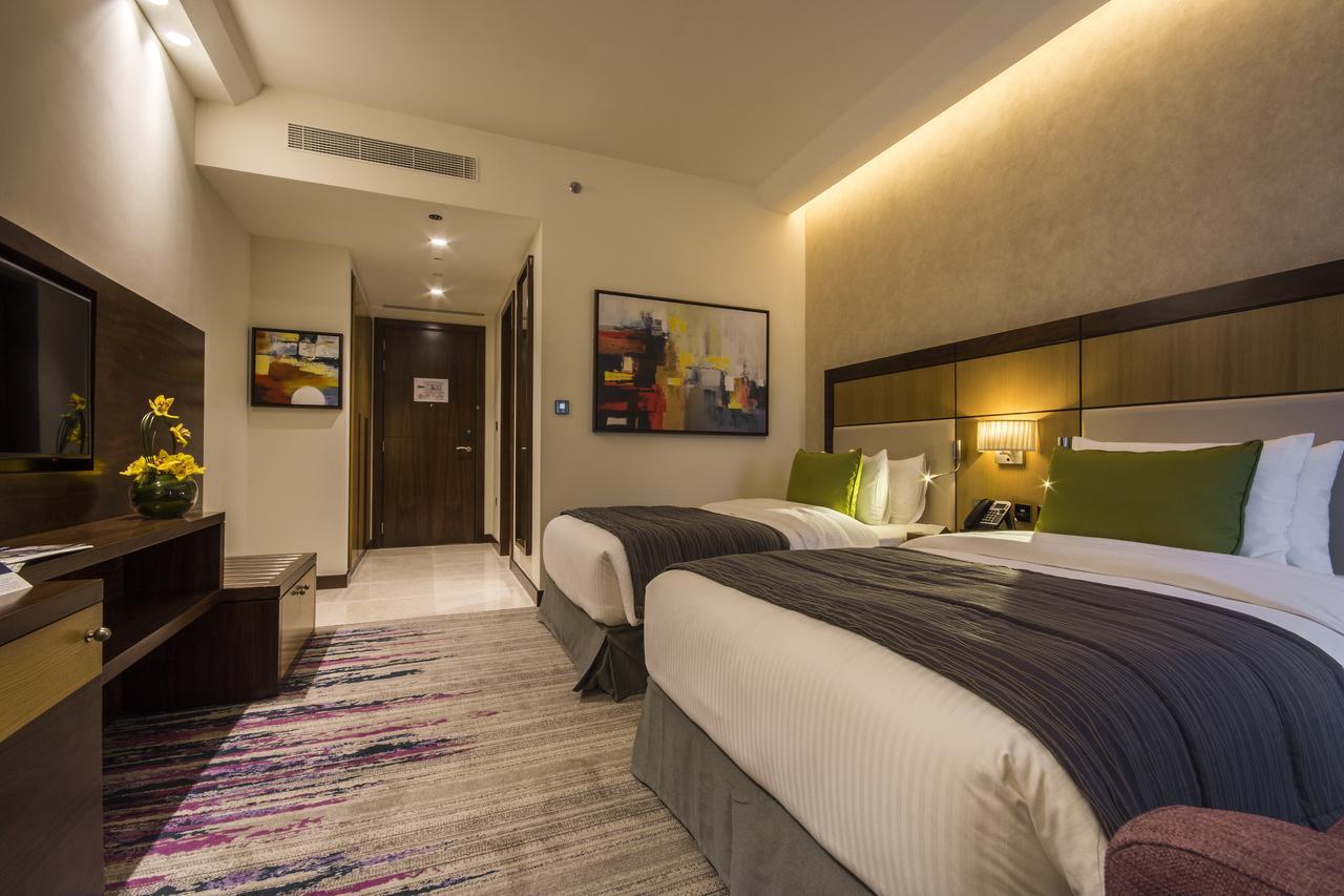 Chambre Lits Jumeaux Deluxe (Transferts Gratuits vers la plage et Certains Centres Commerciaux - 20 % de Réduction sur la Nourriture et les Boissons & Spa)